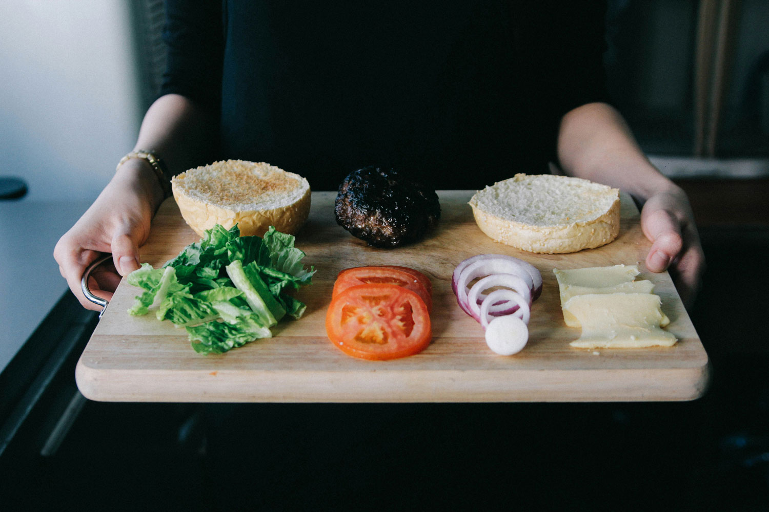 Person holding tray of ingredients